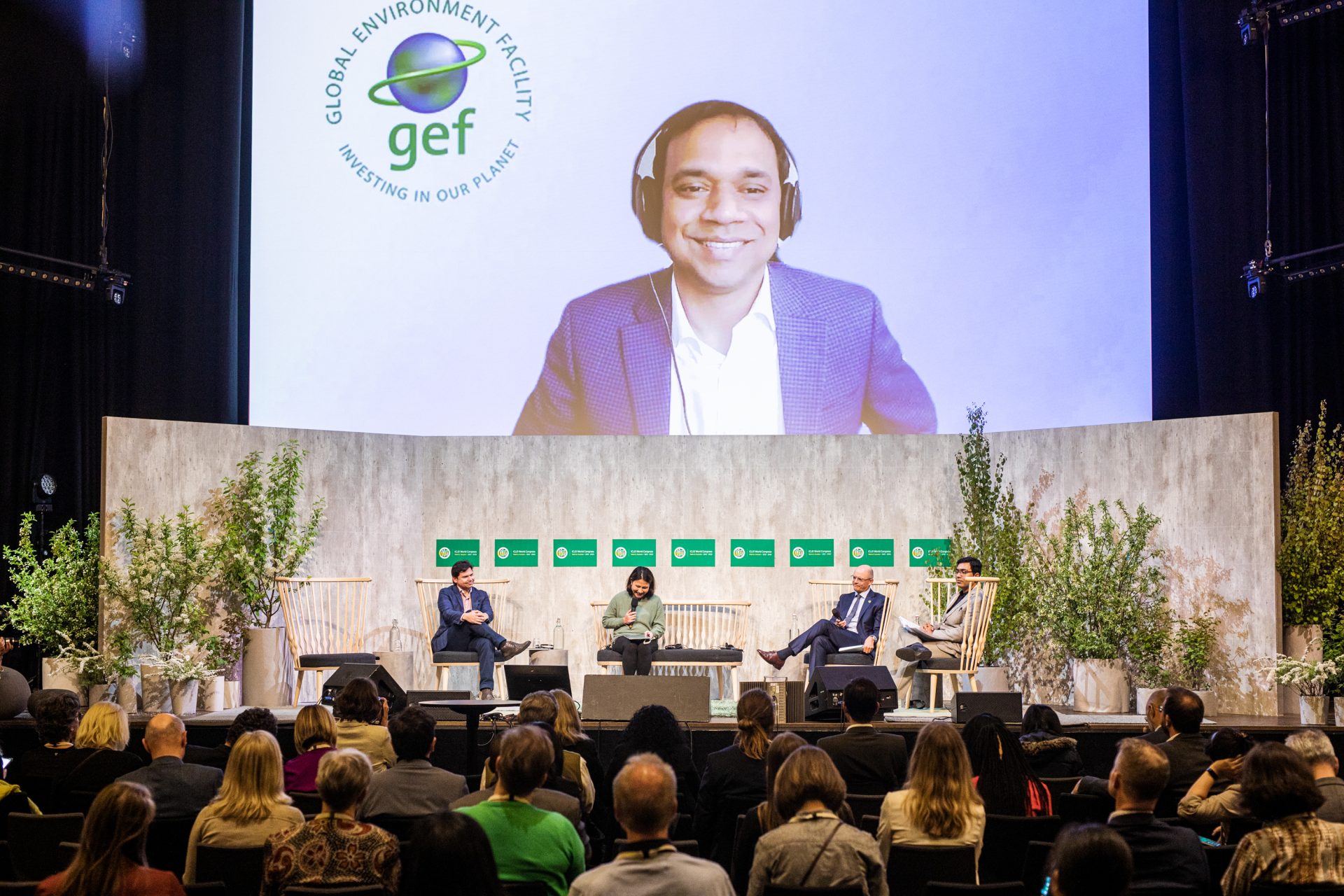 A group of panelists seated on stage at the ICLEI World Congress.