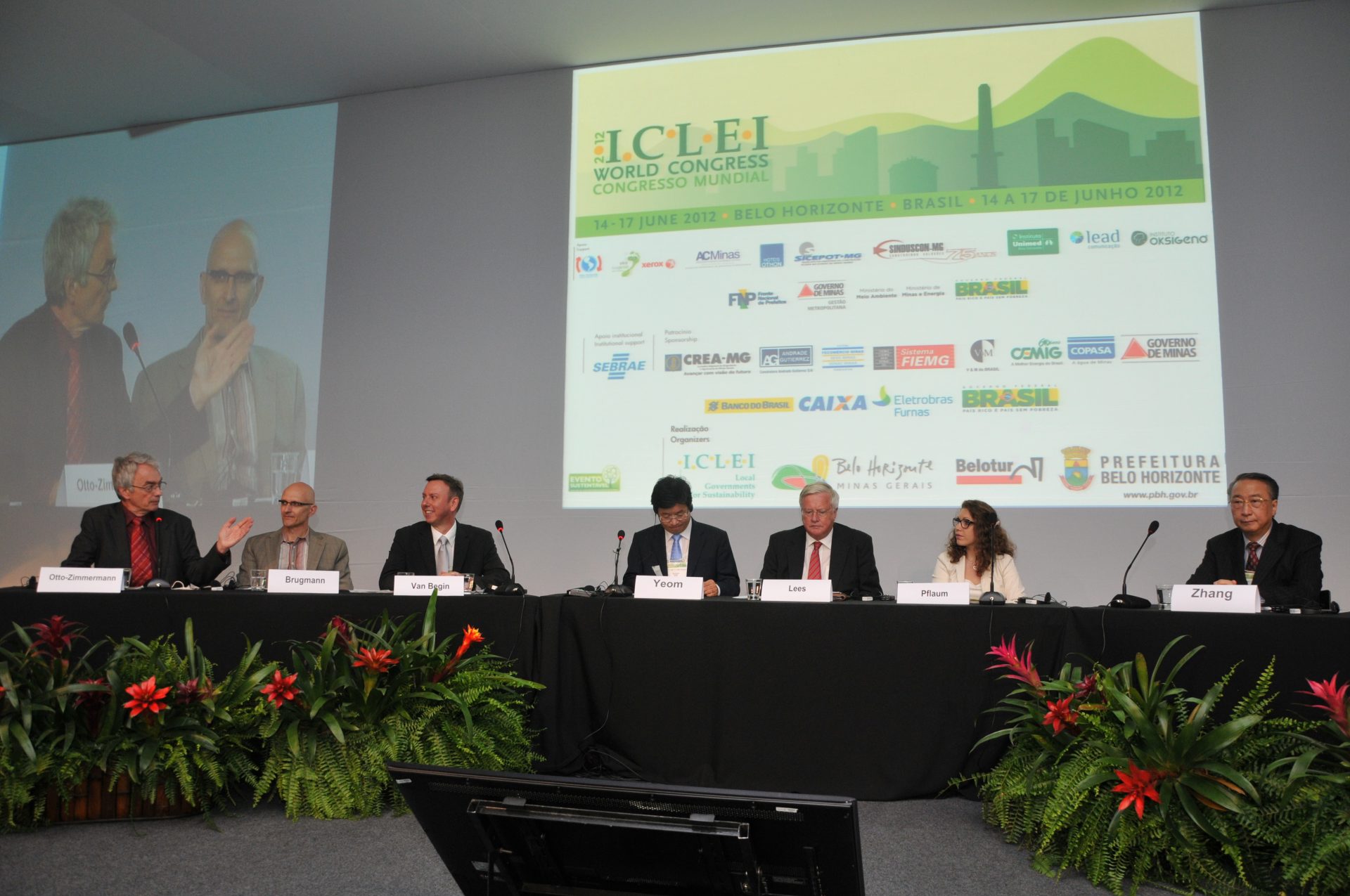 A diverse group of panelists on stage at ICLEI 2012 sharing their expert knowledge with attendees.